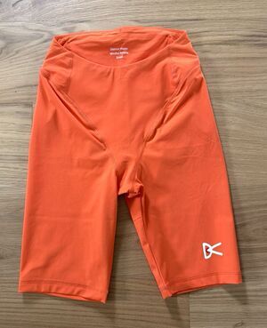 NWOT District Vision Women Maya Half Tights S Orange Running Cycling Gym Shorts